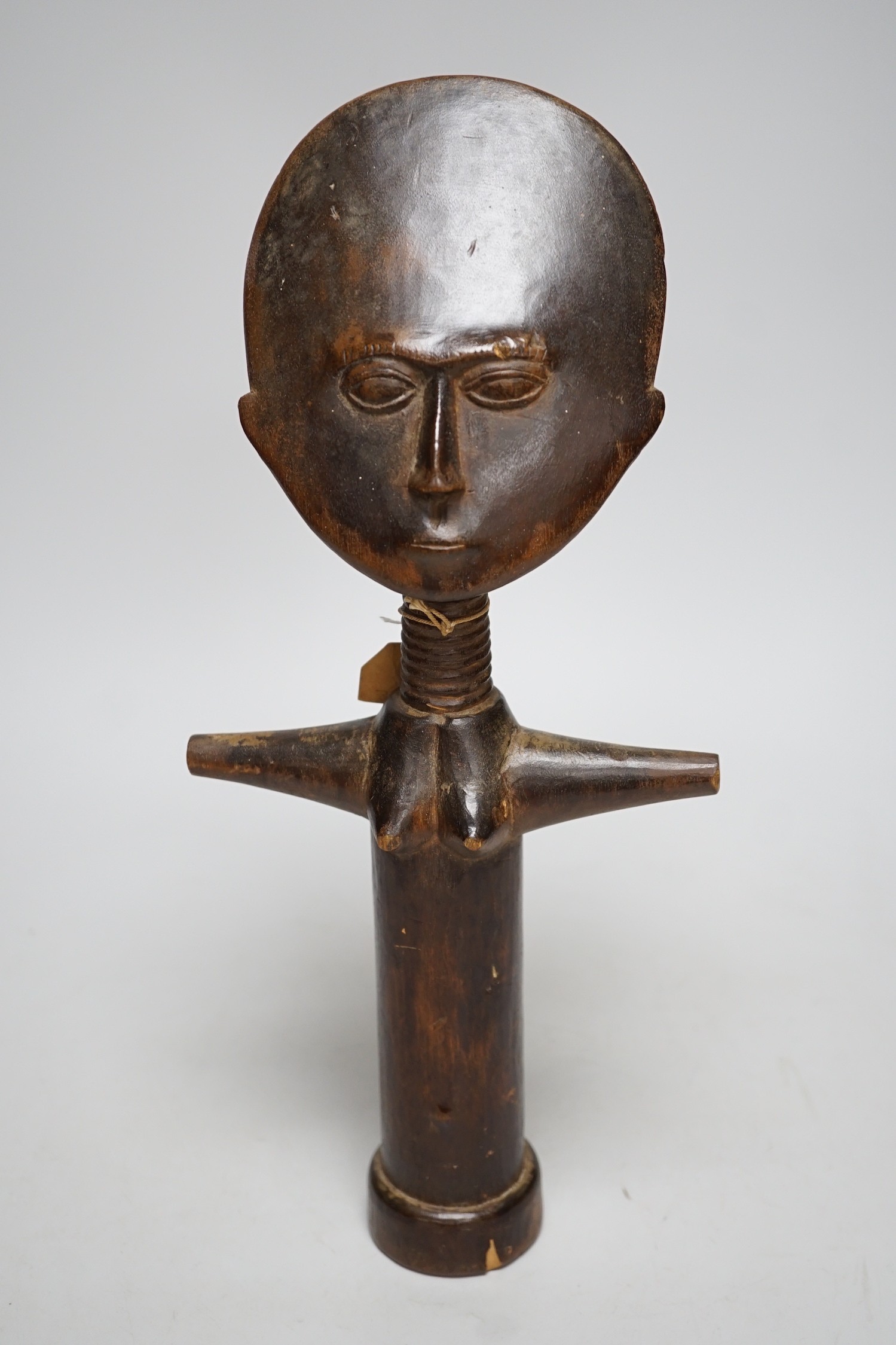 A wooden fertility figure, Ashanti, 34.5cm